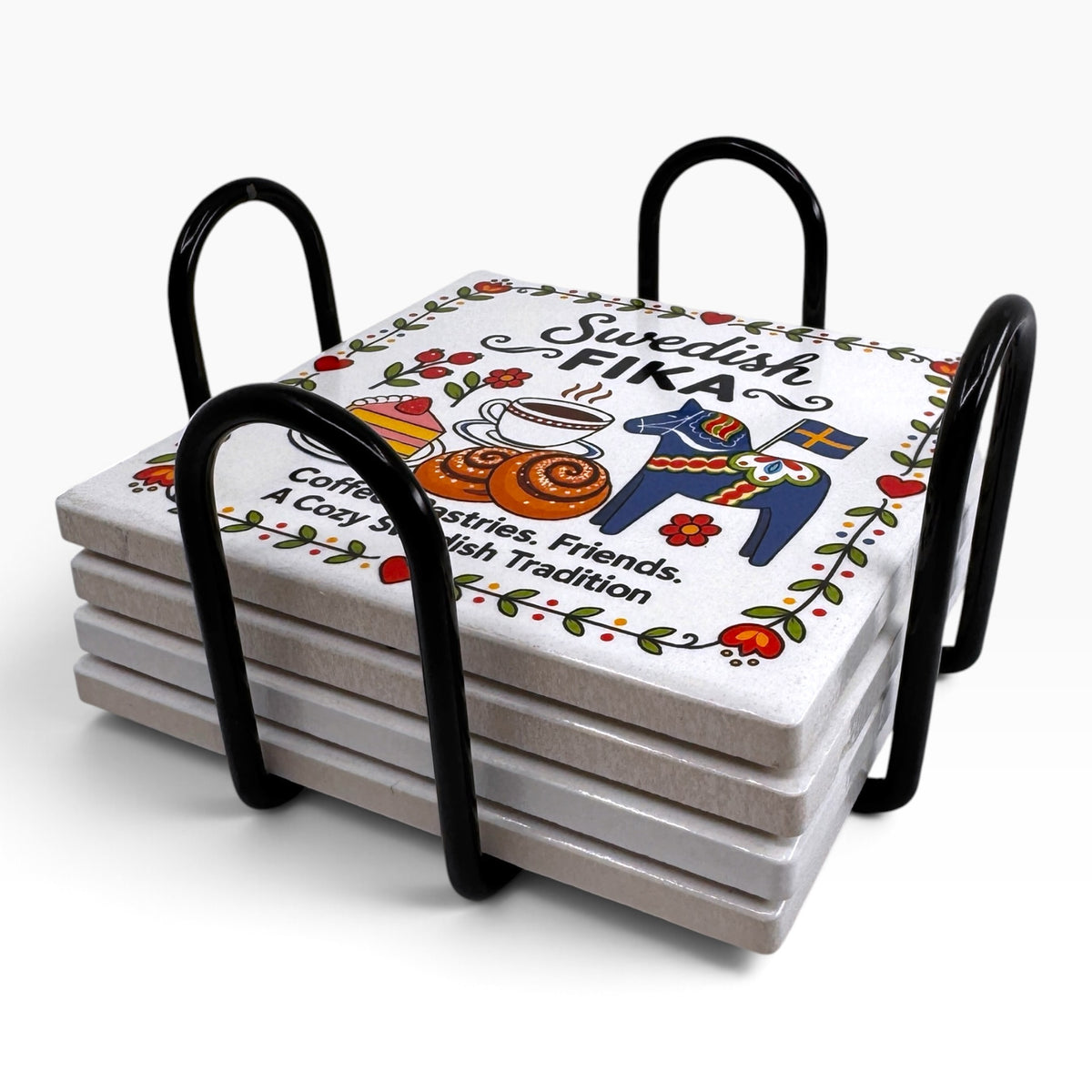 Set of four square coasters in a black metal holder; top coaster features Swedish folk-art with coffee, pastries, blue Dala horse, and floral motifs.