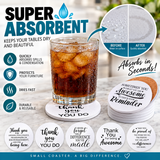 Glass of soda on an absorbent coaster with the printed message “thank you for all you do” in black text.