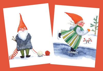 Kirsten Sevig's Gnome Gift Cards feature two charming illustrations: one with a gnome standing next to yarn and another of a gnome skating on ice, both adorned in red hats and winter attire. These whimsical designs are perfect for Christmas holiday greetings. Available as a set of 10 assorted cards.