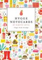 The Card Pack: Hygge Notecards by Kirsten Sevig includes 8 blank cards (4 designs) and 8 envelopes, featuring cozy illustrations on recycled paper for an eco-friendly touch.
