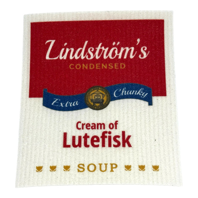The Swedish Gift Store's "Dishcloth: Cream of Lutefisk Soup Swedish Dishcloth" features a playful Campbell’s-inspired soup can label in red, blue, and gold on white—great for any reusable kitchen cloth or Swedish gift.