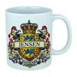 Elevate your drinkware with the Nordic Wholesale Mug: Denmark Coat of Arms Custom Name Ceramic Mug (11 oz Capacity)—a white ceramic heritage mug showcasing a vibrant Danish family crest with the Jensen name, blue lions, red Danish flags, a crowned shield, and "Danmark" below—ideal as a personalized Denmark mug.