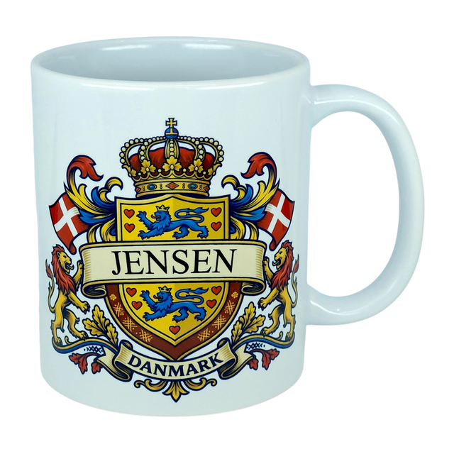 Elevate your drinkware with the Nordic Wholesale Mug: Denmark Coat of Arms Custom Name Ceramic Mug (11 oz Capacity)—a white ceramic heritage mug showcasing a vibrant Danish family crest with the Jensen name, blue lions, red Danish flags, a crowned shield, and "Danmark" below—ideal as a personalized Denmark mug.