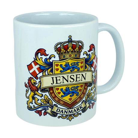 Celebrate your Danish heritage with the Mug: Denmark Coat of Arms Custom Name Ceramic Mug (11 oz Capacity) by Nordic Wholesale. This white ceramic mug showcases a vibrant heraldic crest featuring a crown, lions, and flags, with your custom name displayed in the center and "Danmark" on a banner below—making it a striking personalized tribute to your roots.