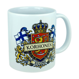 Show your Finnish pride with the Nordic Wholesale Mug: Finland Coat of Arms Custom Name Ceramic Mug (11 oz Capacity), featuring a white ceramic design adorned with the Korhonen family crest—a crowned shield, lions, Finnish flags, and “SUOMI” below—making it a perfect personalized mug to celebrate your heritage.
