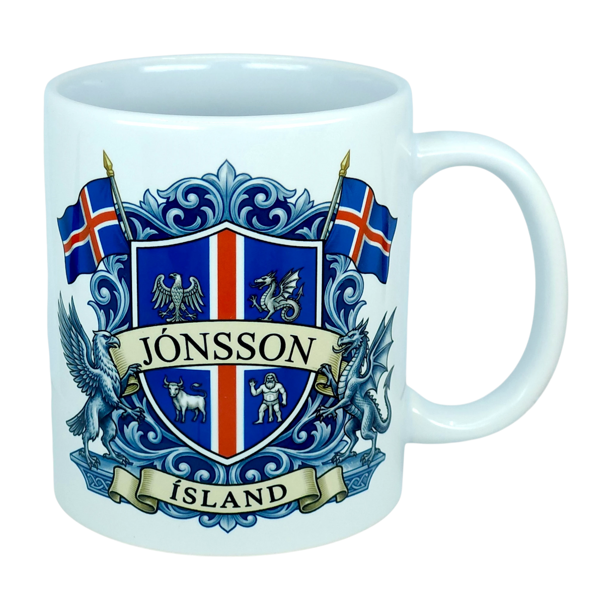 Introducing the Mug: Iceland Coat of Arms Custom Name Ceramic Mug (11 oz Capacity) by Nordic Wholesale—a white ceramic mug featuring a vibrant blue and red Icelandic crest, the custom name “Jónsson” boldly across the center, “Ísland” below, two Icelandic flags, and detailed Landvættir-inspired heraldic symbols including a griffin and a dragon—perfect as a personalized gift to celebrate your Icelandic heritage.