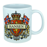 Enjoy your morning coffee with the Mug: Norway Coat of Arms Custom Name Ceramic Mug (11 oz Capacity) by Nordic Wholesale, featuring a white ceramic design adorned with a crest of two Norwegian flags, golden lions, and crown. Personalize it with your family name on the banner above “NORGE” for the perfect heritage gift—an ideal way to celebrate Norwegian roots!.