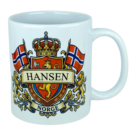 Enjoy your morning coffee with the Mug: Norway Coat of Arms Custom Name Ceramic Mug (11 oz Capacity) by Nordic Wholesale, featuring a white ceramic design adorned with a crest of two Norwegian flags, golden lions, and crown. Personalize it with your family name on the banner above “NORGE” for the perfect heritage gift—an ideal way to celebrate Norwegian roots!.