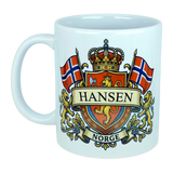 Sip your favorite beverage from the Nordic Wholesale Mug: Norway Coat of Arms Custom Name Ceramic Mug (11 oz Capacity), featuring a detailed crest with two Norwegian flags, a crown, gold lions, and a shield. Personalize it with your family name displayed on a banner above "Norge," making this mug the perfect Norwegian coat of arms keepsake and a thoughtful gift to celebrate Norway heritage.