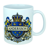 Celebrate your heritage with the Mug: Sweden Coat of Arms Custom Name Ceramic Mug (11 oz Capacity) from Nordic Wholesale—a white ceramic mug featuring a bold blue and gold Swedish coat of arms design, two Swedish flags, gold lions, your custom name (e.g. ANDERSSON) in prominent letters, and "SVERIGE" on a banner below the crest; this unique and personalized Sweden mug is perfect for showcasing national pride.