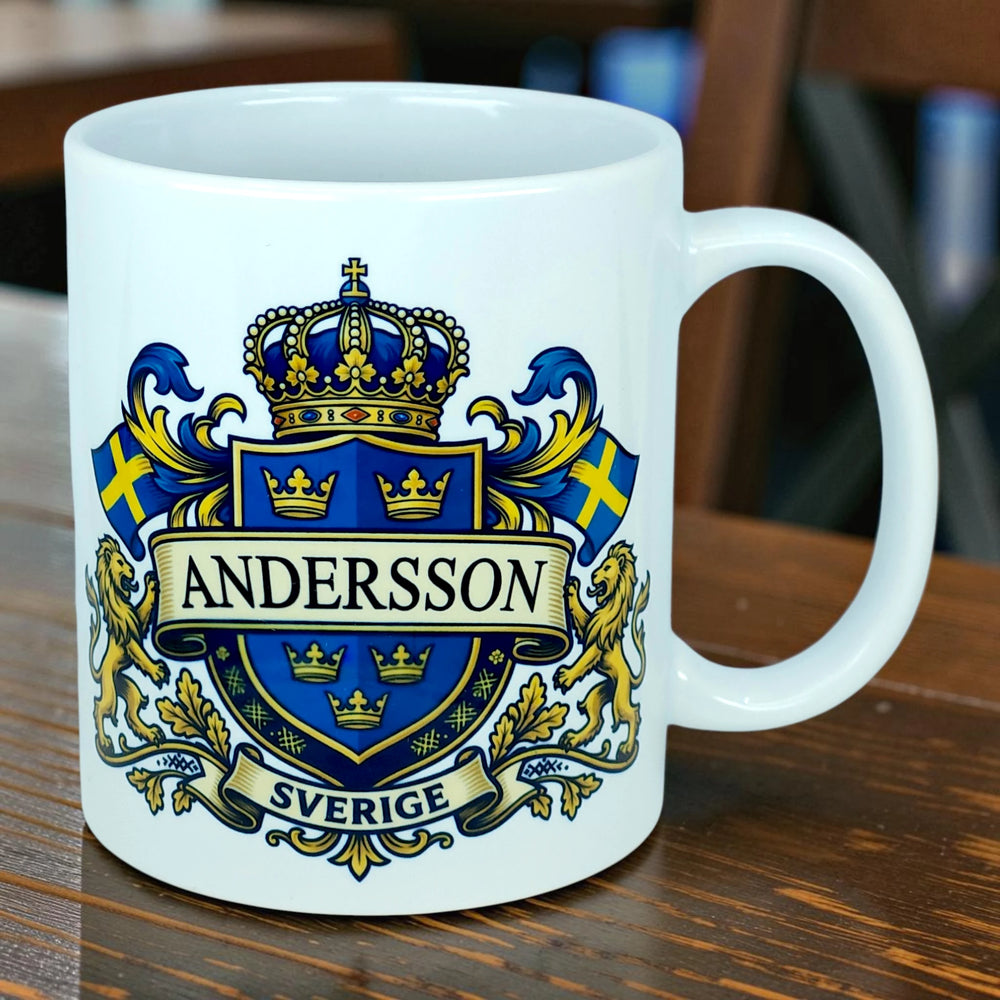 White mug featuring a blue and gold Swedish coat of arms, two Swedish flags, lions, crowns, the word ANDERSSON, and SVERIGE on a wooden table.
