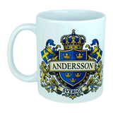 Introducing the Nordic Wholesale Mug: Sweden Coat of Arms Custom Name Ceramic Mug (11 oz Capacity)—a white ceramic mug adorned with a Swedish-style blue and gold crest featuring your custom name, two Swedish flags, gold lions, and a regal crown above. Beneath the design, "SVERIGE" is written on a banner, making this personalized mug the perfect way to celebrate and display your Swedish heritage.