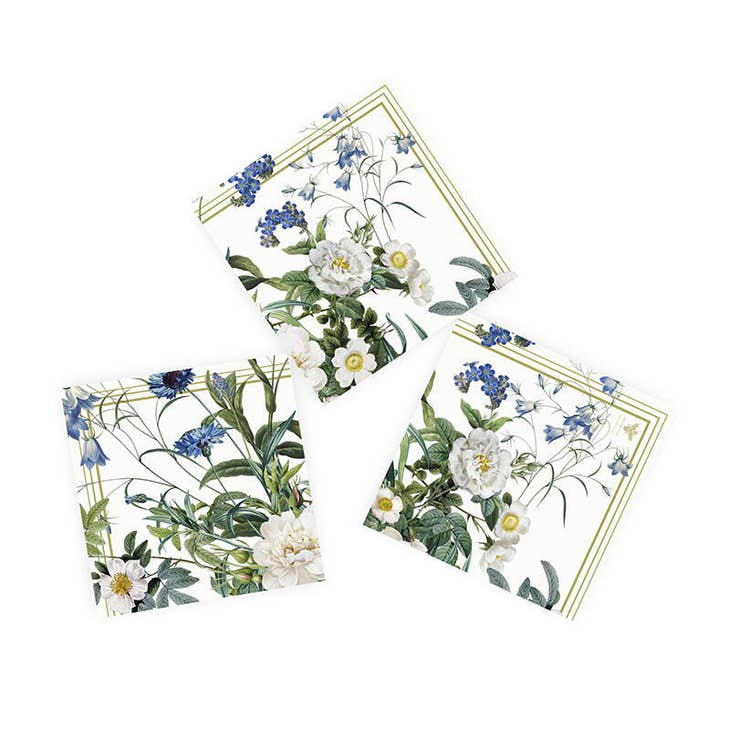 Three paper napkins from the "Napkins: Blue Flower Garden" collection feature a delicate design of blue and white blooms on a crisp white background. These environmentally friendly napkins add an elegant touch to any table setting.