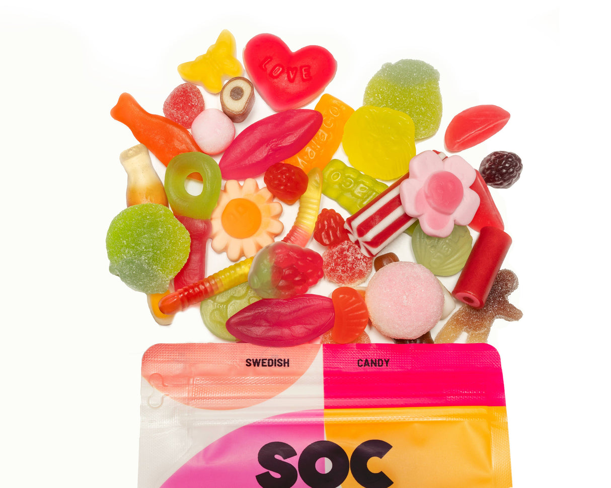 An 8oz bag of Sweet Mix Sockerbit Swedish Gummy Candy features an assortment of colorful, uniquely shaped gummies displayed above its opened packaging labeled "Swedish Candy.