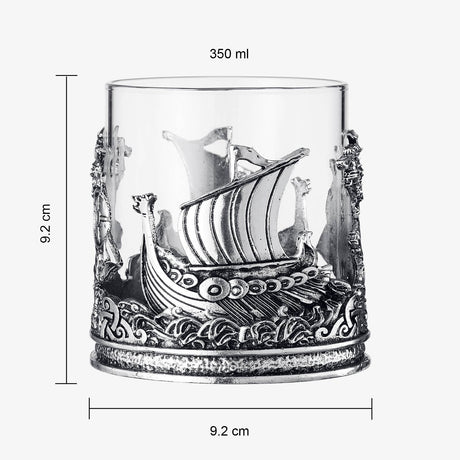 The Glass: Viking & Mythological Whiskey Drinking Glass - 12 OZ is a clear tumbler (350 ml, 9.2 cm tall/diameter) with a metal Viking ship design around the base—ideal as an old fashioned liquor or Viking whiskey glass.