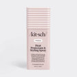 A pink spray bottle with a black pump, labeled “Kitsch,” standing upright on a plain white background.