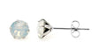 A pair of October White Opal Sparkling Speck Swarovski® Crystal Stud Earrings with round white opal crystals set in white gold rhodium plated prongs and posts, displayed against a white background.