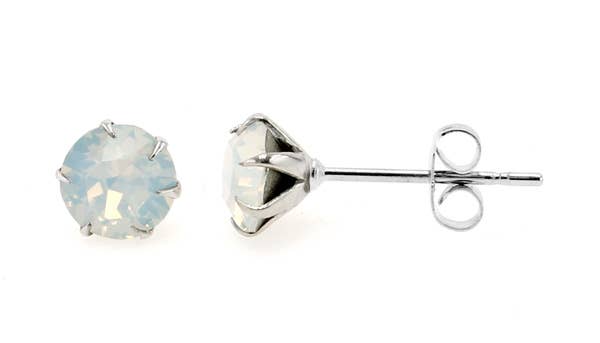 A pair of October White Opal Sparkling Speck Swarovski® Crystal Stud Earrings with round white opal crystals set in white gold rhodium plated prongs and posts, displayed against a white background.