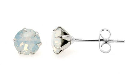 A pair of October White Opal Sparkling Speck Swarovski® Crystal Stud Earrings with round white opal crystals set in white gold rhodium plated prongs and posts, displayed against a white background.