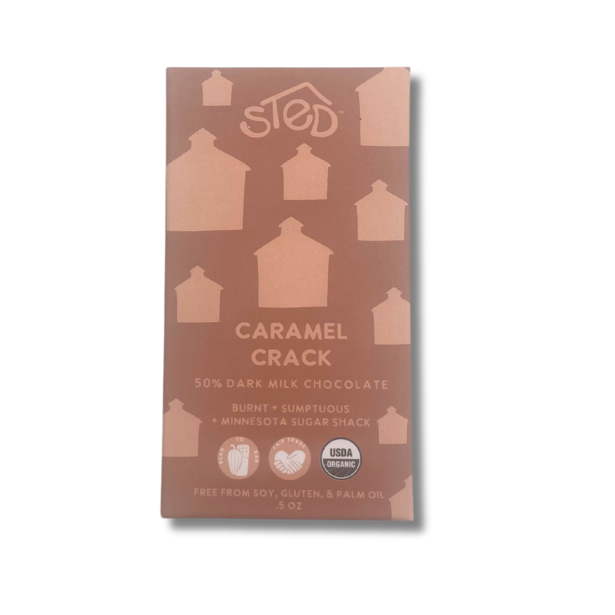 Chocolate bar with house silhouettes on the packaging, USDA Organic logo, and text noting “burnt” flavor and free from soy, gluten, and palm oil.