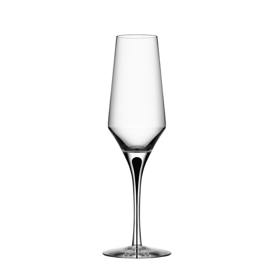A clear, empty Orrefors Metropol Champagne Glass 9oz with a long stem and slightly tapered bowl, set against a plain white background.