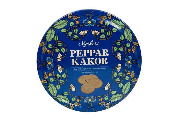 Blue tin featuring Nyåker's Peppar Kakor text, adorned with a floral design and an image of delicious Gingerbread cookies from the "Nyakers Gingersnap Blue Tin 14.11oz" product line.