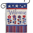 Display the Welcome Patriotic Americana Star and Stripes Floral Flag on a black flag pole to showcase American pride with its red, white, and blue stars, stripes, flowers, and weather-resistant fabric.
