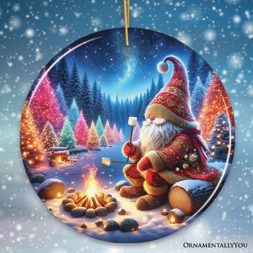 The Majestic Winter World Gnome Camper Ceramic Ornament features a whimsical Santa figure sitting by a campfire roasting marshmallows, surrounded by brightly illuminated trees in a snowy forest. This scene perfectly embodies the cozy warmth and festive cheer of the season, making it an ideal addition to your Christmas decor.