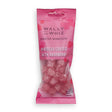A pink bag of Wally & Whiz Gummy Cubes Hibiscus with Raspberries (56g) Danish candy, featuring floral designs on the packaging—an elegant Scandinavian vegan treat.