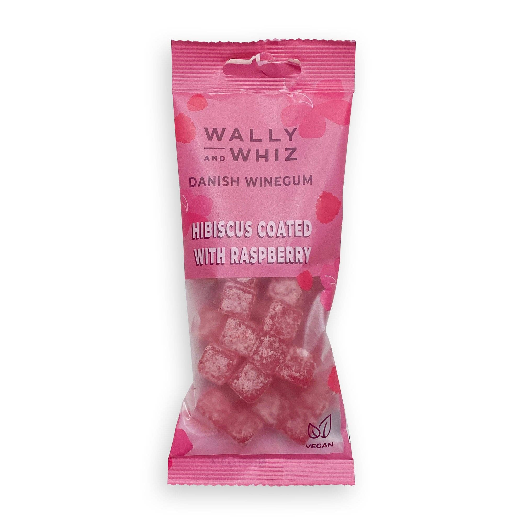 A pink bag of Wally & Whiz Gummy Cubes Hibiscus with Raspberries (56g) Danish candy, featuring floral designs on the packaging—an elegant Scandinavian vegan treat.