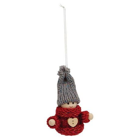Small gnome ornament with gray knit hat, red sweater featuring a heart, wooden hands, smiling face, and attached hanging string.
