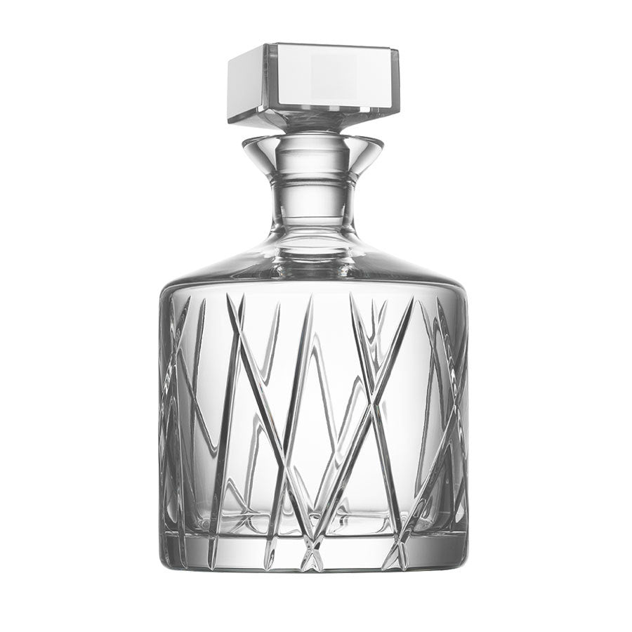 The Orrefors: City Decanter 32oz, with geometric patterns and a square stopper, is elegantly displayed against a plain white background.