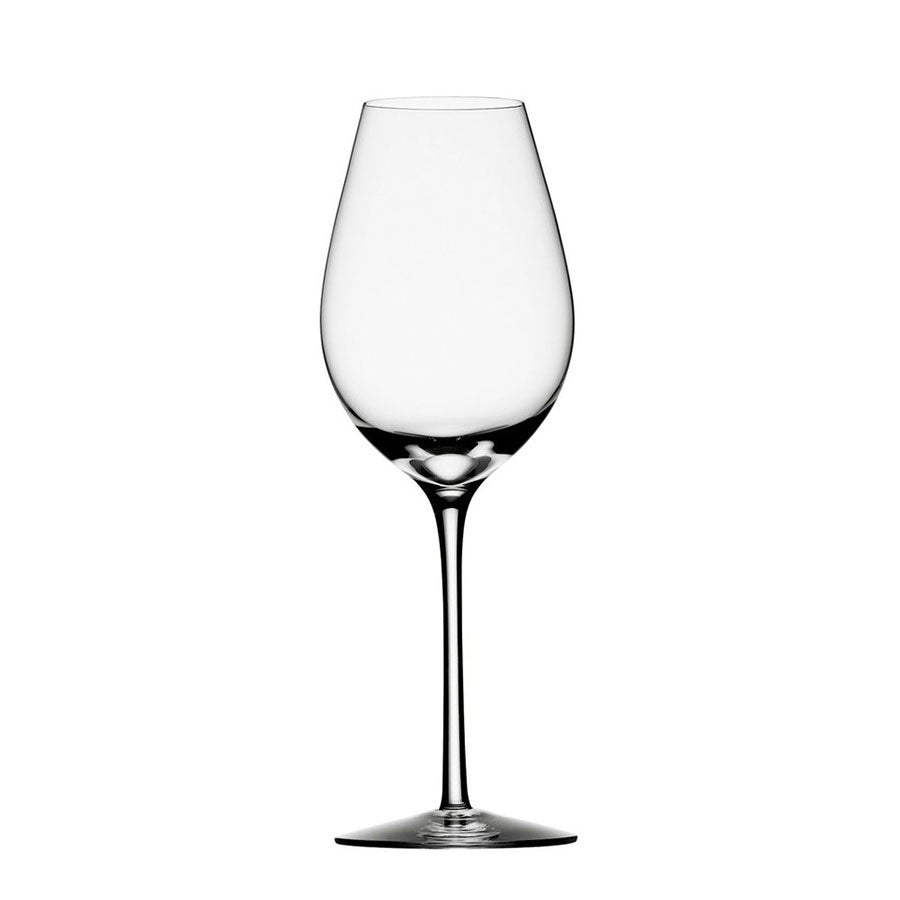 A mouth-blown masterpiece, the Orrefors Difference Crisp 15oz wine glass features a long stem and wide bowl, echoing Erika Lagerbielkes elegance on a pristine white backdrop.