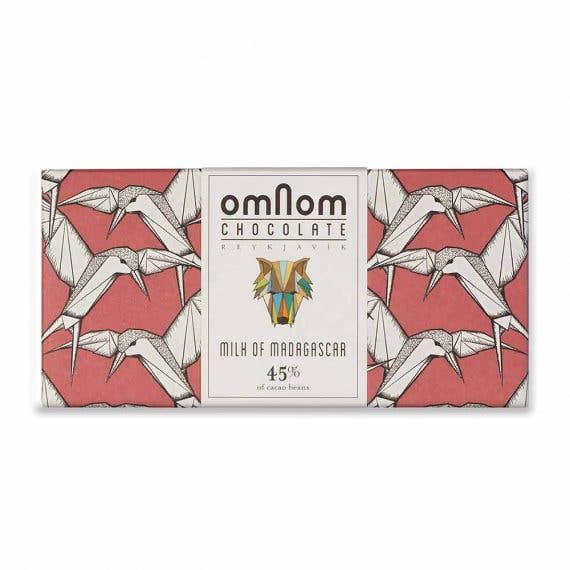 OmNom Milk Chocolate of Madagascar 45% (60g) features a geometric bird design on a pink background with illustrated birds—a unique Icelandic chocolate creation.