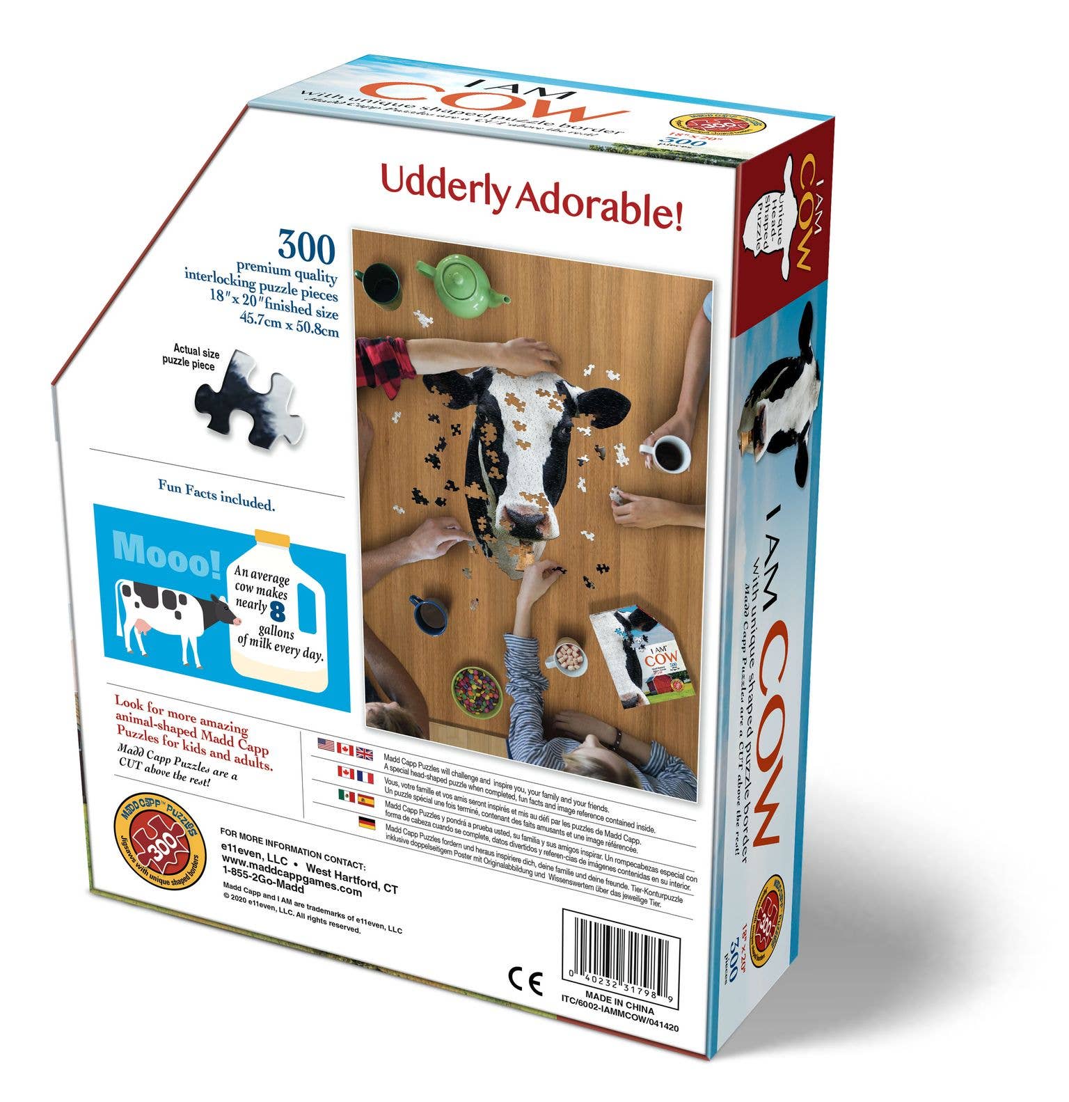 This creatively designed jigsaw puzzle showcases a charming cow image on a wooden table. It consists of 300 pieces made from premium quality chipboard and comes with educational fun facts. Upon completion, the puzzle proudly displays the phrases: "Udderly Adorable!" and "I AM COW.