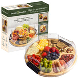 A round bamboo charcuterie board with a removable clear plastic cover, holding an assortment of cheese, fruit, nuts, and meats, shown in and out of its packaging.