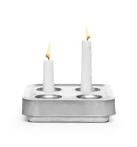 Candle Holder: Stumpastaken Fyran Four Candle Holder - Square in 100% recycled material White Powder-coated