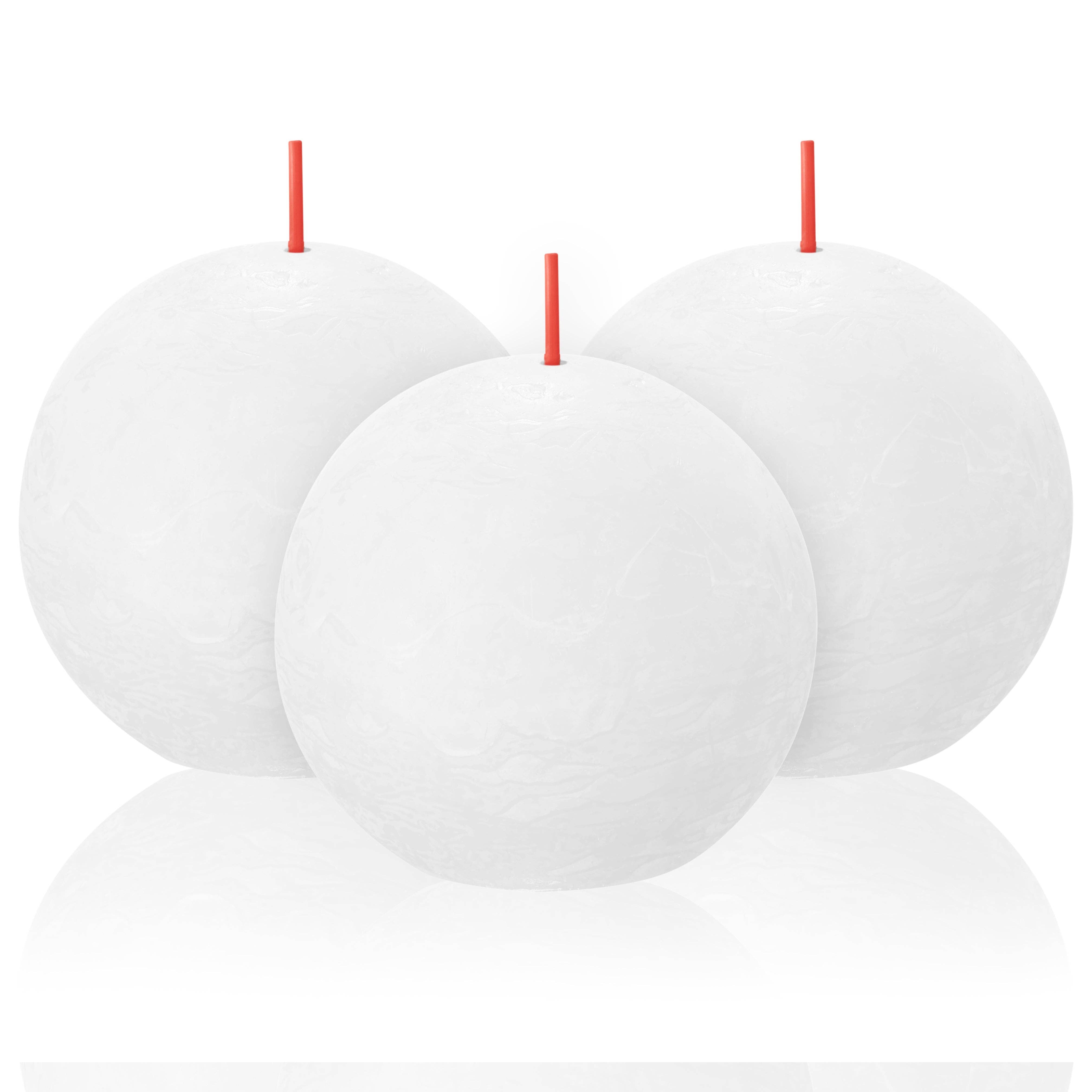 Three Blossom Pink rustic ball candles made from plant-based, eco-friendly wax are arranged side by side on a white surface.