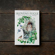 The Card Pack: Birds of the Forest - Skovens Fugle Card Folder by Koustrup & Co, Denmark, features 8 unique designs of forest birds and a tree with an owl in a hollow on its illustrated cover, displayed on a dark wooden surface.