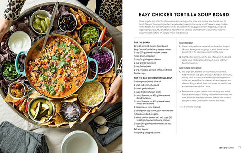 Create a delightful chicken tortilla soup board for family meals with "Big Boards for Families." This setup includes an array of toppings like crispy chips, sliced avocados, zesty lime, olives, crunchy cabbage, and cheese. The book provides recipe instructions and a convenient list of ingredients on the right side for effortless hosting.