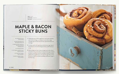 Open *Beautiful Brunches*, revealing a delicious recipe for maple and bacon sticky buns on the left page, with three beautifully arranged sticky buns in a wooden tray on the right page—ideal for those seeking decadent desserts or planning exquisite brunch gatherings.