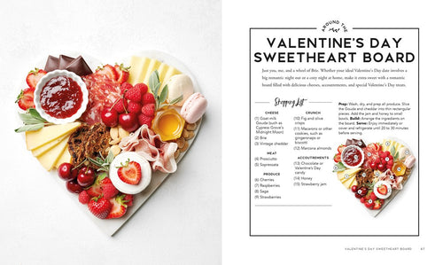 The *Around the Board* book offers a delightful heart-shaped charcuterie board that is perfect for entertaining. This charming design includes an array of cheese, meats, fruits, nuts, and a small bowl of dip, making it an ideal option for a seasonal celebration like Valentine's Day with its delicious assortment of treats.