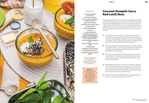 Two bowls of pumpkin curry soup, garnished with seeds and cream, sit beside a recipe excerpt from "Book: Every Season is Soup Season." Mint leaves and utensils are placed on a yellow cloth, enhancing the cozy appeal of this delicious soup—ideal for healthy recipes on chilly nights.