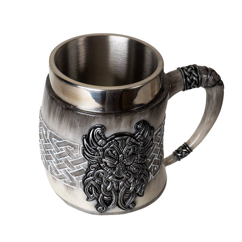 The Mug: Viking Odin's Horn Drinking Mug features a metal and resin build, Celtic knot patterns, a raised Viking face, and a decorated handle—making it an ideal novelty gift for Norse mythology fans.