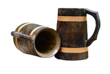 Two Coffee Mugs: Wooden Viking Tankards with a vibrant orange finish (16–18 oz), one upright and one on its side, showcase handcrafted Nordic charm against a clean white background.
