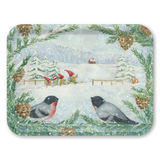 Nordic scene with two bullfinches on snowy pine branches, gnomes skiing nearby, a red house in the background, and snow falling.