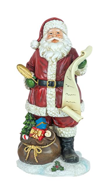 The Resin Santa with His List (9.75" H) features a figurine as part of your Christmas decor, showcasing Santa Claus holding a list and bread while standing alongside a sack of presents and a small decorated tree.