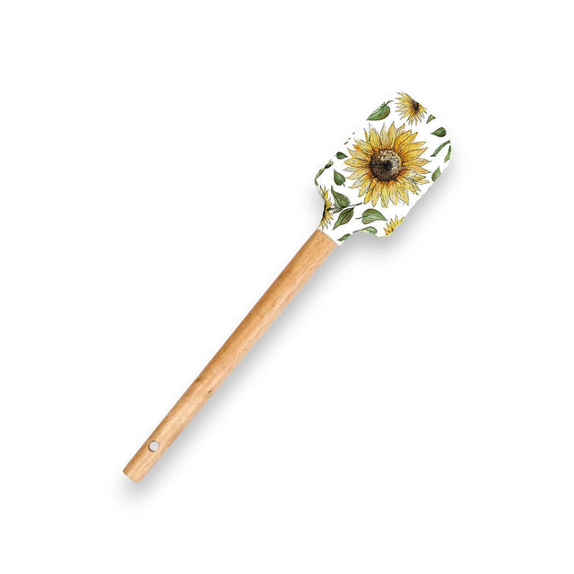 Spatula with a sunflower design and leaf pattern on the yellow silicone head, featuring a smooth wooden handle.