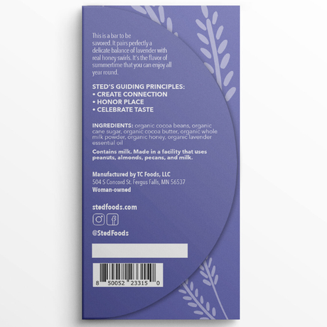 Purple chocolate wrapper with white text listing ingredients, organic milk chocolate and allergen info, and decorative lavender illustrations.