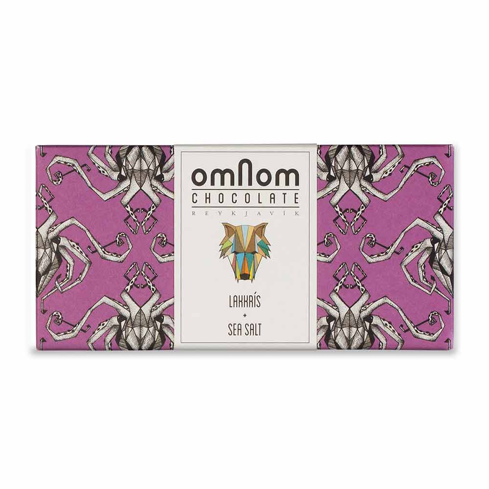 OmNom Lakkris + Sea Salt is a 60g Icelandic white chocolate bar with licorice and sea salt, from Reykjavik. Bold flavors come wrapped in a striking package with an abstract geometric animal design and illustrated pattern.